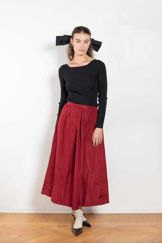 The Dancer Knit Top by Nackiye is a fine rib top with an open back and grosgrain bow ties on the back