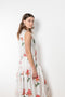 The Daydream Dress by Nackiye is a silk chiffon dress with a seasonal floral print