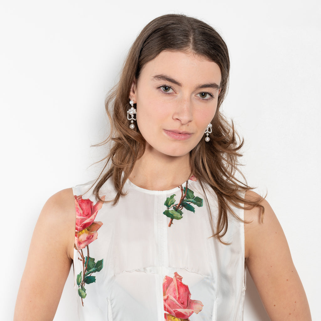 The Daydream Dress by Nackiye is a silk chiffon dress with a seasonal floral print