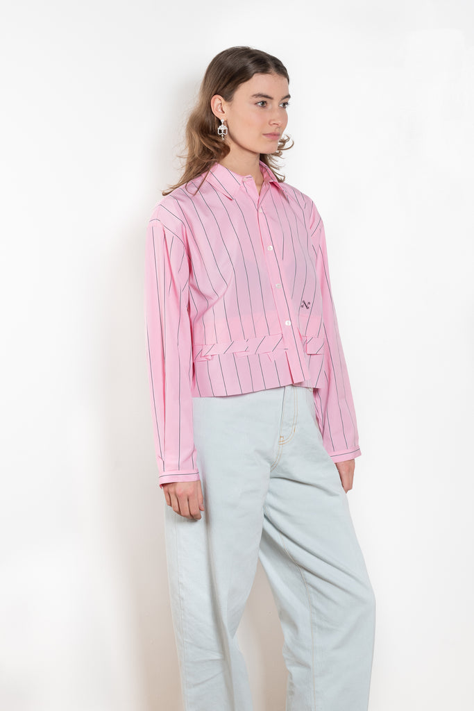 The Kawai Shirt by Nackiye is a classic cropped shirt with tapered sleeves and hand raped ruffle detail with raw edges