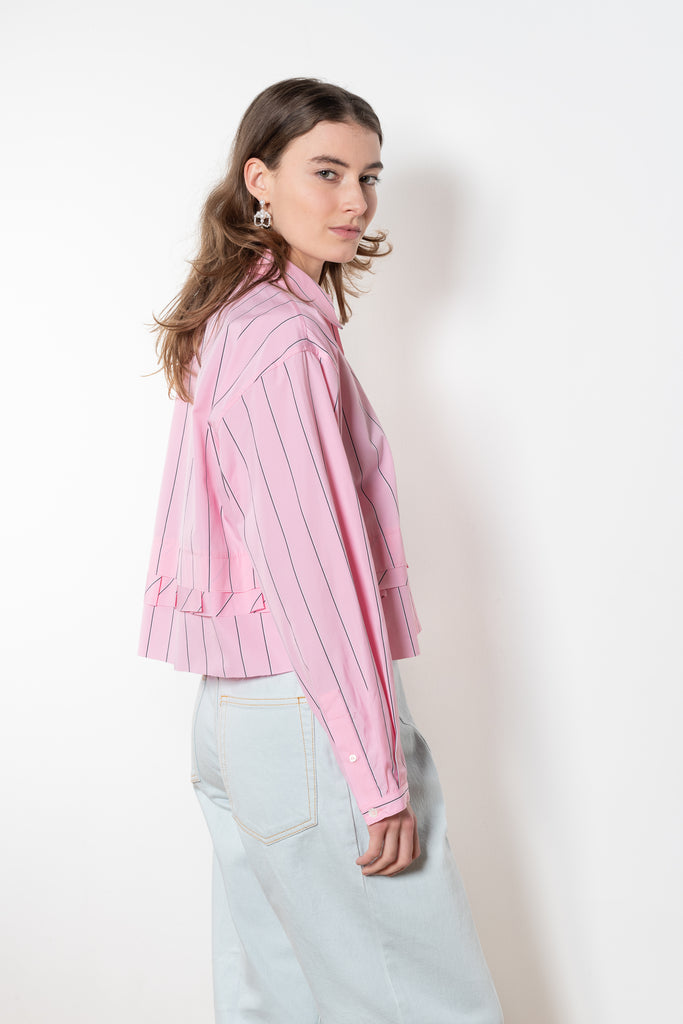 The Kawai Shirt by Nackiye is a classic cropped shirt with tapered sleeves and hand raped ruffle detail with raw edges