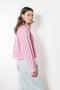 The Kawai Shirt by Nackiye is a classic cropped shirt with tapered sleeves and hand raped ruffle detail with raw edges