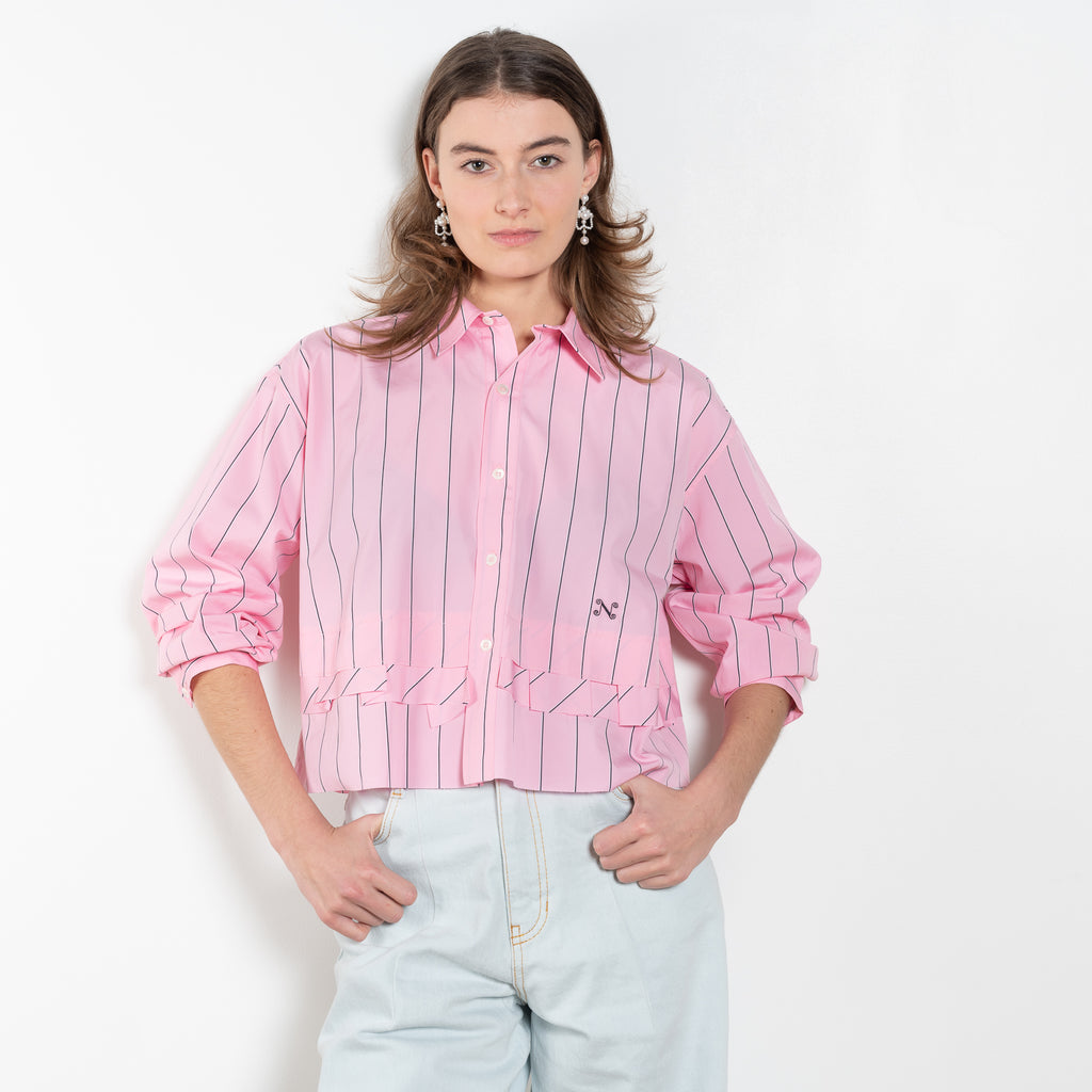 The Kawai Shirt by Nackiye is a classic cropped shirt with tapered sleeves and hand raped ruffle detail with raw edges