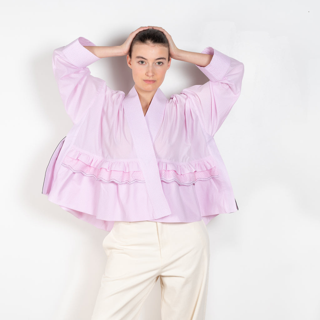 L'Orient Top by Nackiye is a cotton kimono top with mesh embellishments that can be worn as a jacket