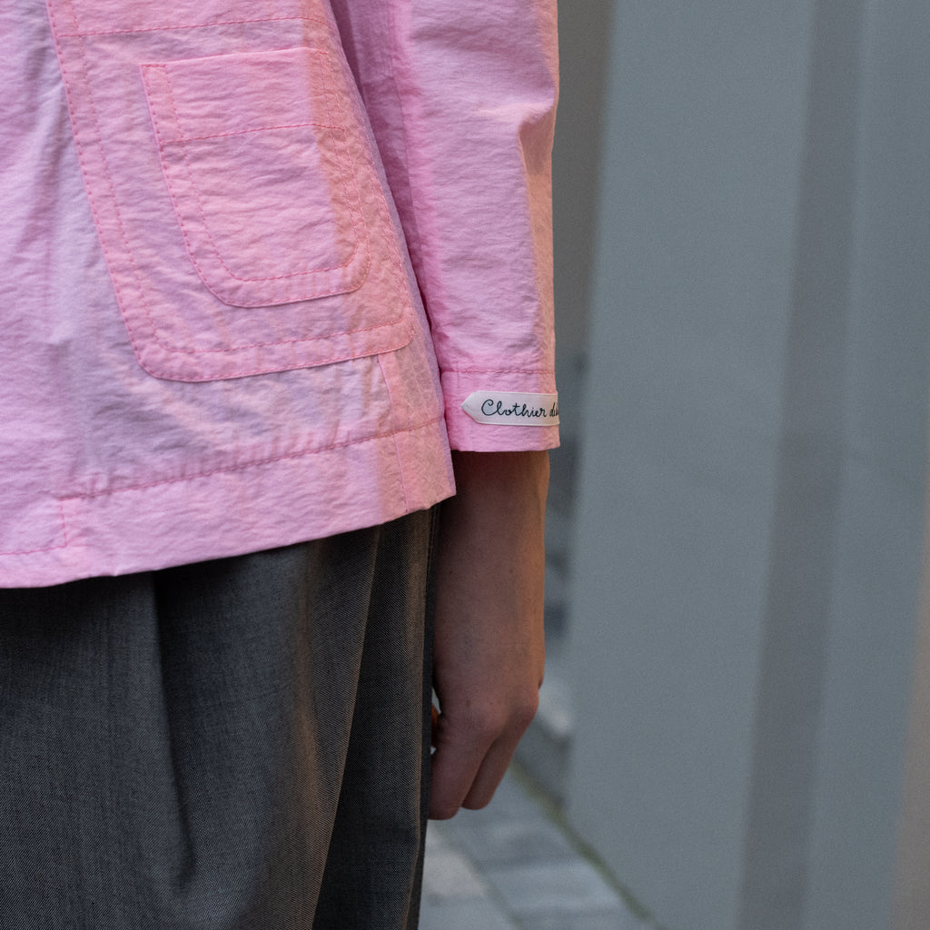 The Second Skin Jacket by Nackiye is a fitted tailored shirt jacket in a bright candy pink cotton blend