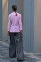 The Second Skin Jacket by Nackiye is a fitted tailored shirt jacket in a bright candy pink cotton blend