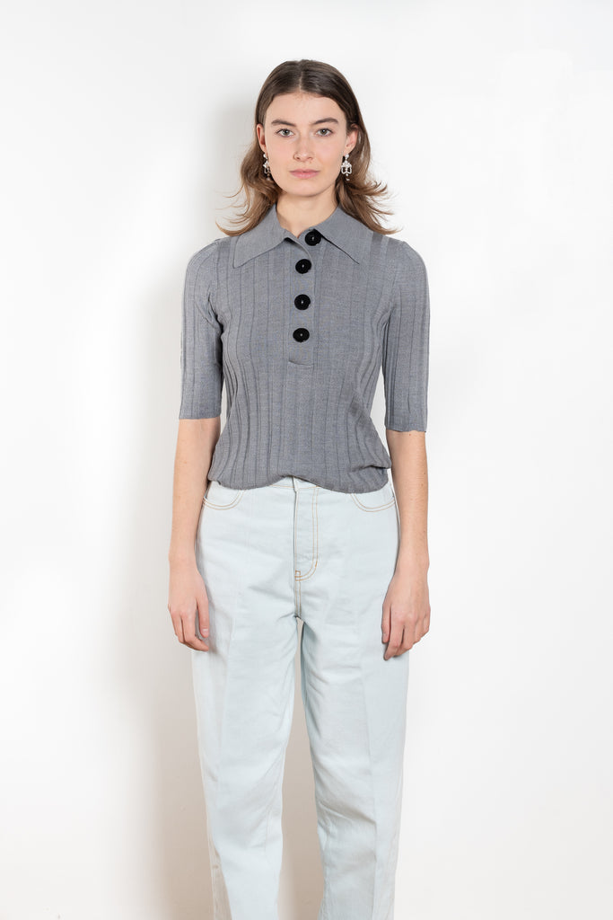 The Sugarman Polo by Nackiye is a fine knit polo with mother of pearl buttons