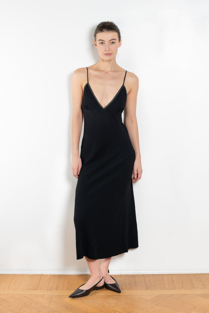 The Take Me Out Dress by Nackiye is a 90s inspired strappy A line dress with hidden elastic on the back