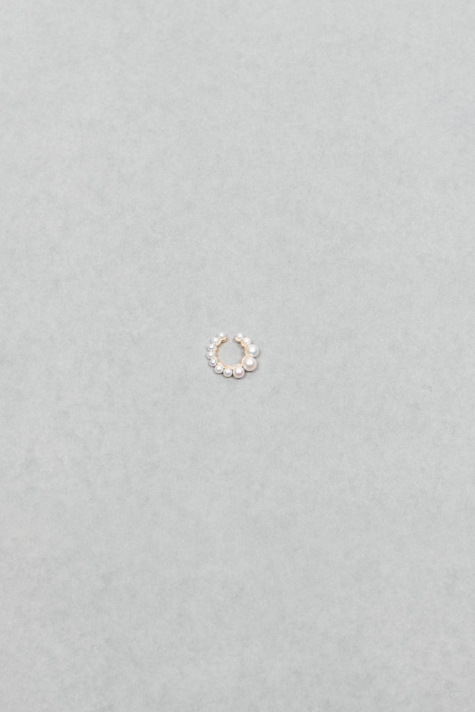 The Cuff De Perle Earcuff by Sophie Bille Brahe is inspired by the Boucle de Perle earrings, this cuff has a flow of graduating freshwater pearls