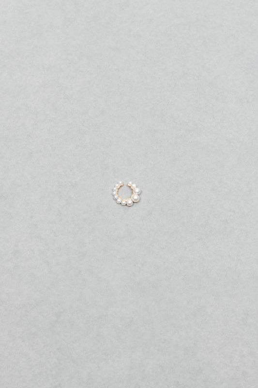 The Cuff De Perle Earcuff by Sophie Bille Brahe is inspired by the Boucle de Perle earrings, this cuff has a flow of graduating freshwater pearls