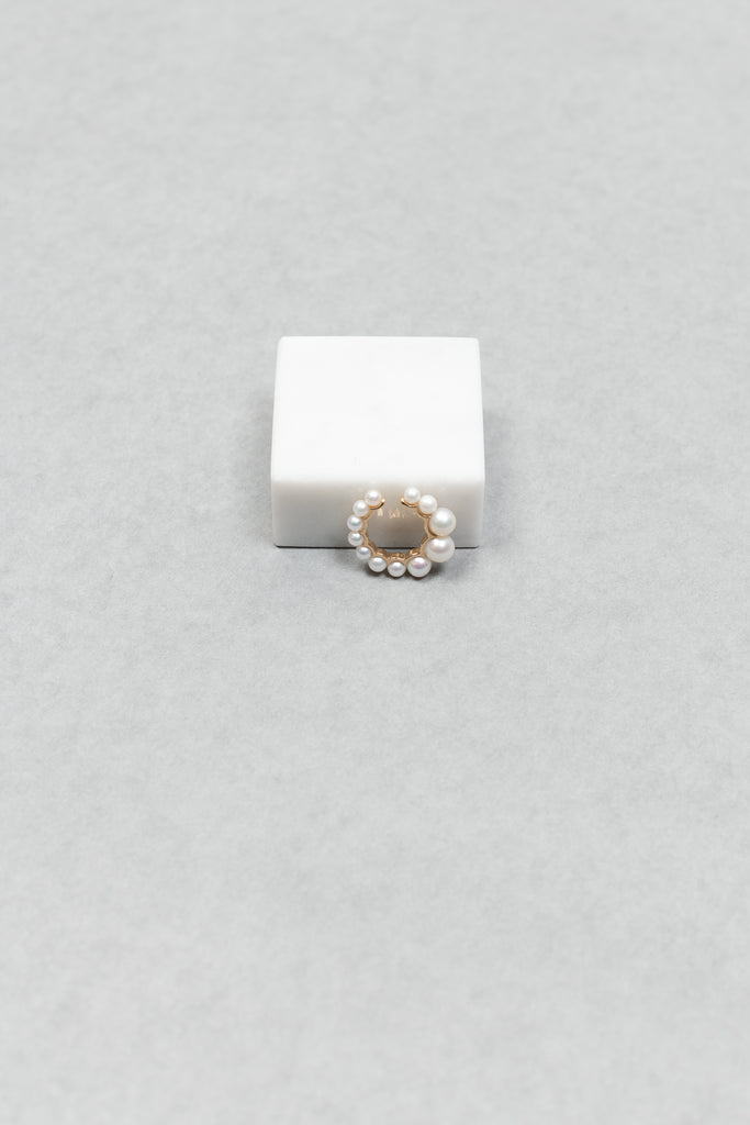 The Cuff De Perle Earcuff by Sophie Bille Brahe is inspired by the Boucle de Perle earrings, this cuff has a flow of graduating freshwater pearls