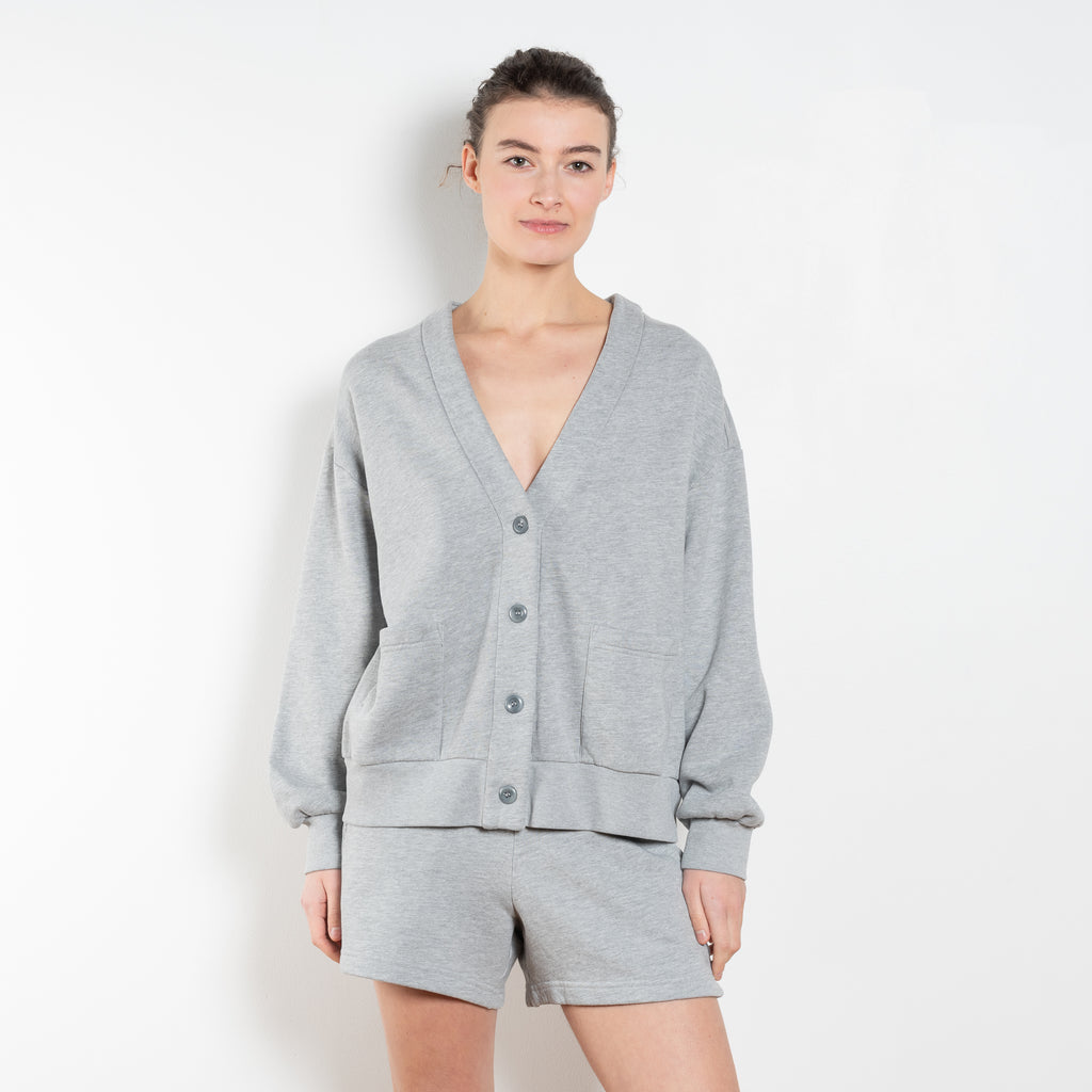 The Benny Cardigan by Xirena is a soft fleece cardigan with baseball inspired details