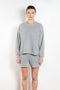 The Honor Sweatshirt by Xirena is a soft fleece sweater with a slight cropped fit and raw cut hem