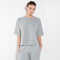 The Romeo Sweatshirt by Xirena is a soft fleece sweater with short sleeves in a slight cropped fit with a raw cut hem