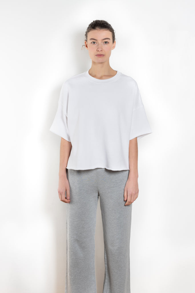 The Romeo Sweatshirt by Xirena is a soft fleece sweater with short sleeves in a slight cropped fit