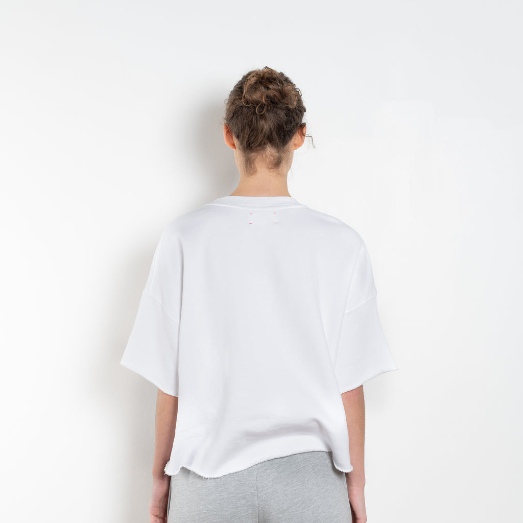 The Romeo Sweatshirt by Xirena is a soft fleece sweater with short sleeves in a slight cropped fit