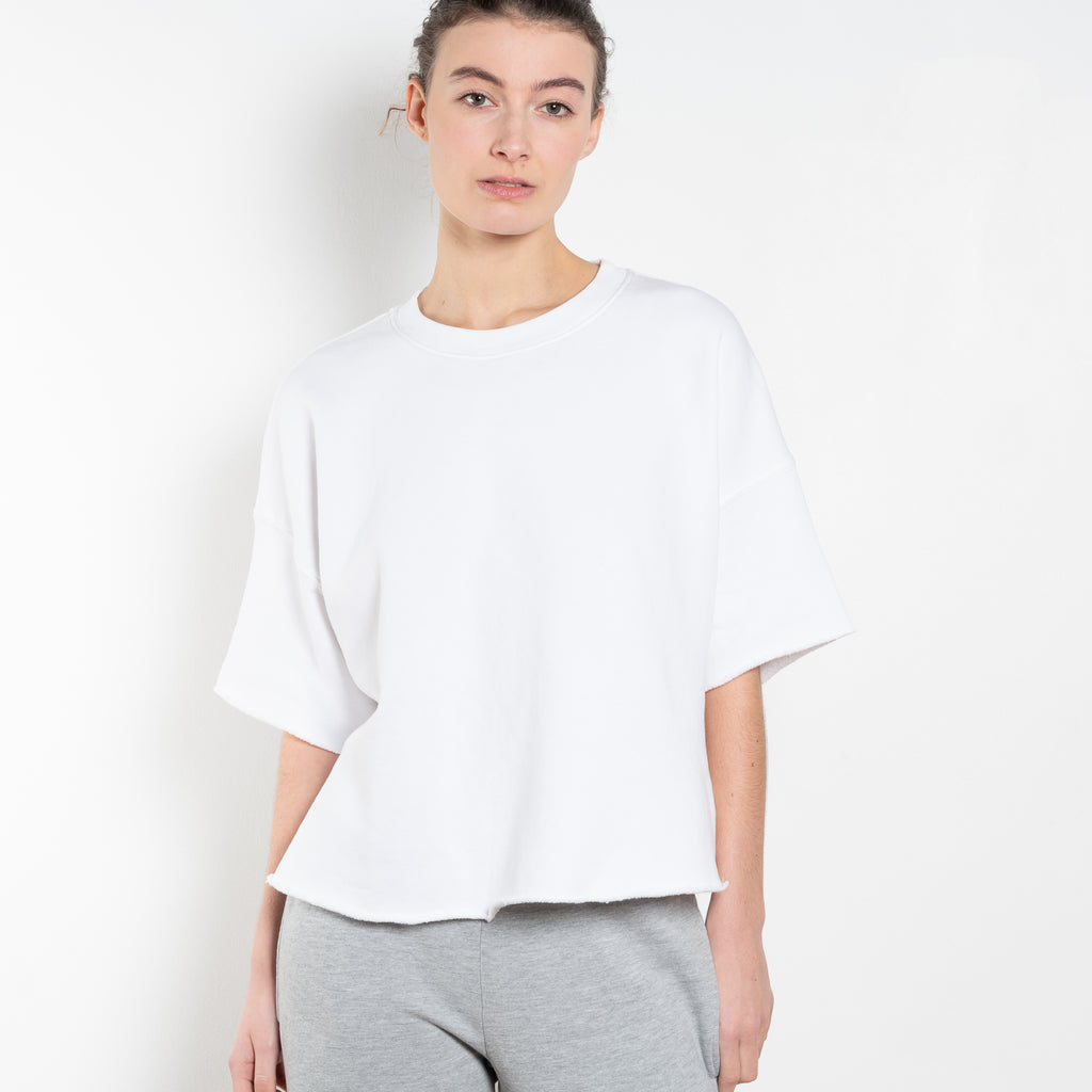 The Romeo Sweatshirt by Xirena is a soft fleece sweater with short sleeves in a slight cropped fit