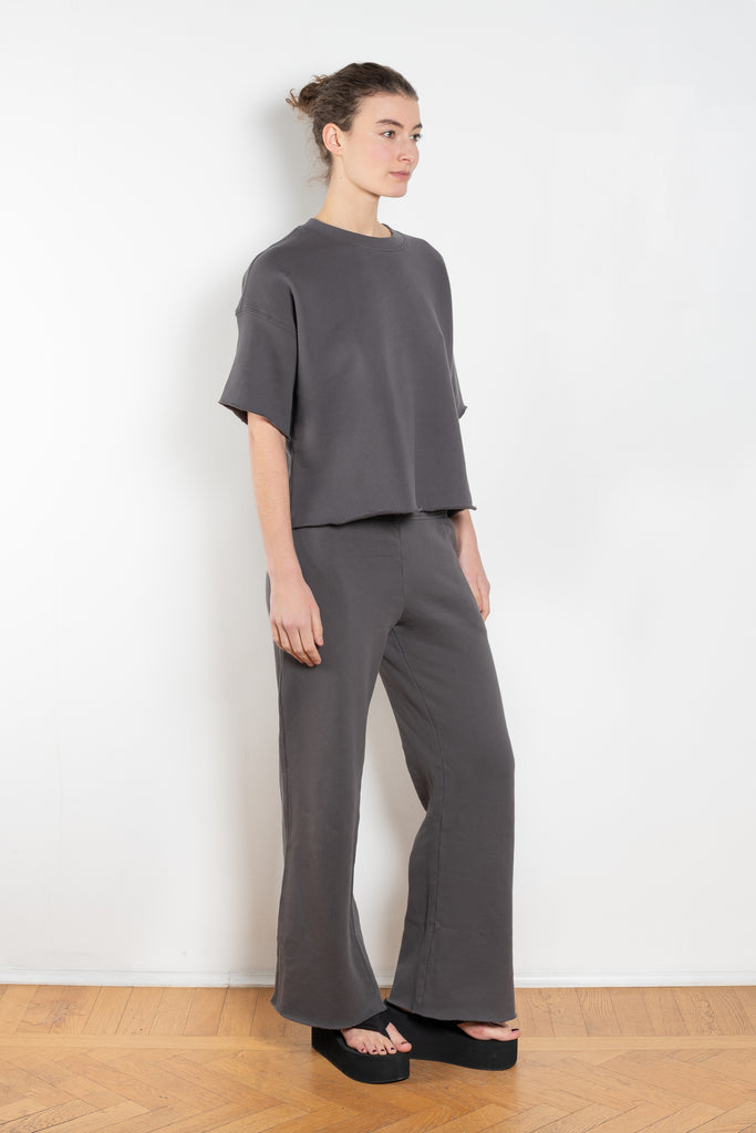 The Romeo Sweatshirt by Xirena is a soft fleece sweater with short sleeves in a slight cropped fit with a raw cut hem