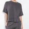 The Romeo Sweatshirt by Xirena is a soft fleece sweater with short sleeves in a slight cropped fit with a raw cut hem