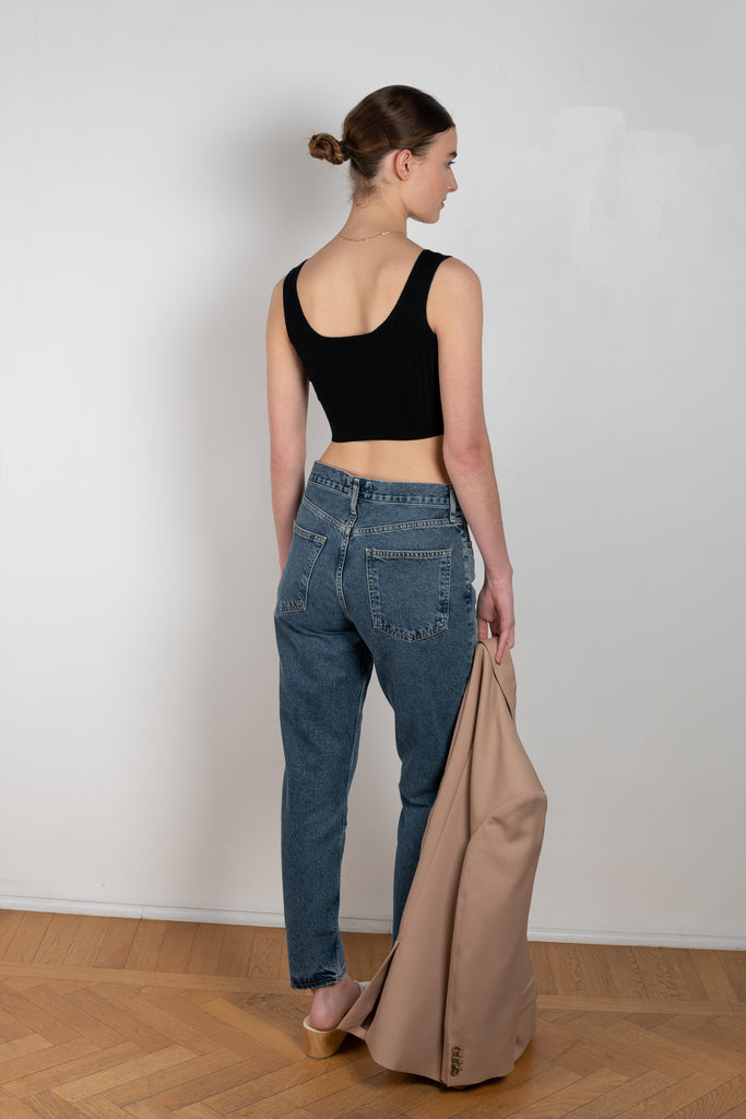 The Fen Jeans by Agolde in color Highway is a relaxed high rise jeans with a tapered ankle length leg in a medium blue wash